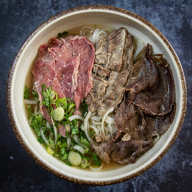 P3. Raw Beef & Brisket & Tendon Pho.