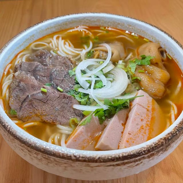 P14. Hue-style spicy beef noodle soup.